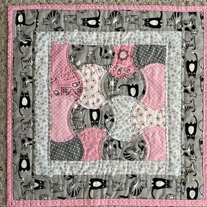 Mini quilt; hand pieced, machine quilted.